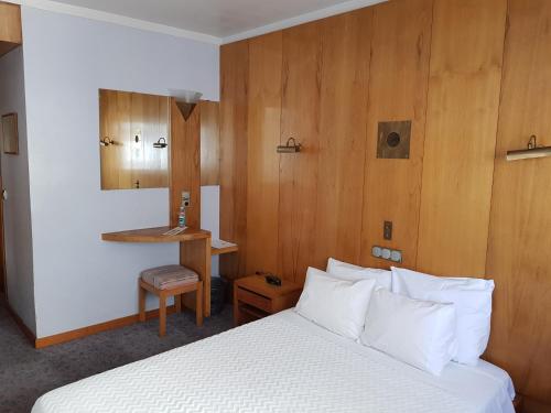 En eller flere senger på et rom på Hotel Nordeste Shalom