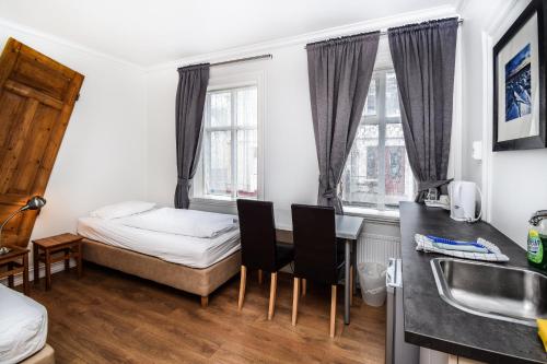 Ένα ή περισσότερα κρεβάτια σε δωμάτιο στο Guesthouse Andrea