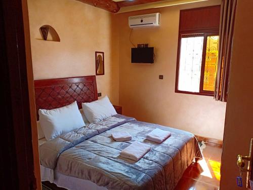 Postel nebo postele na pokoji v ubytování hotel arganier tafraoute