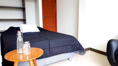 Katil atau katil-katil dalam bilik di MiniApartamentos GRAN IMPERIAL PREMIUM