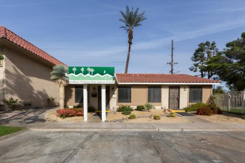 a building with a sign in front of it at Indian Palms Vacation Club in Indio