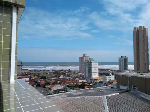 a view of a city from the roof of a building at Apartamento Mirim Praia Grande in Praia Grande