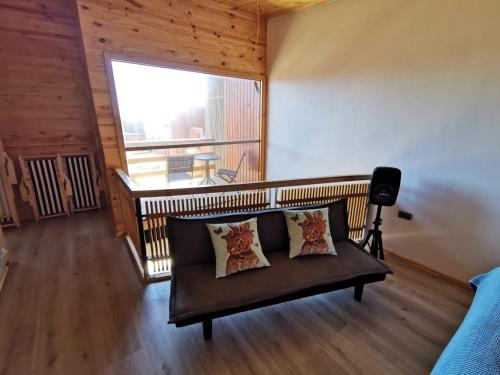 Ein Sitzbereich in der Unterkunft Hermosa casa en Pichilemu, en condominio con salida al mar