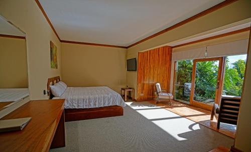 Imagen de la galería de El Establo Mountain Hotel, en Monteverde