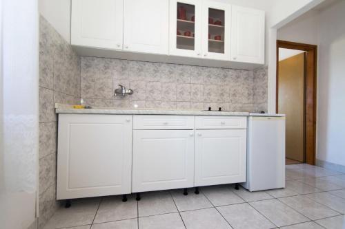 Kuchyň nebo kuchyňský kout v ubytování Apartments Jaksa