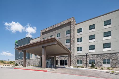 a large office building with a large building at Holiday Inn Express & Suites - Odessa I-20 by IHG in Odessa