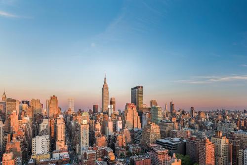 an aerial view of a large city with skyscrapers at EVEN Hotel New York - Times Square South by IHG in New York
