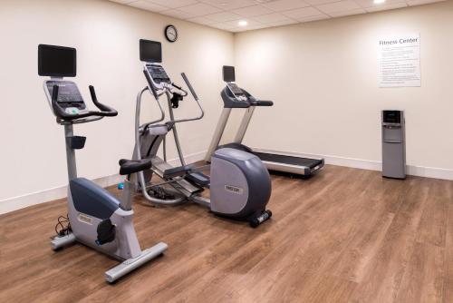 a gym with cardio equipment in a room at Holiday Inn Express Fort Worth West by IHG in Fort Worth