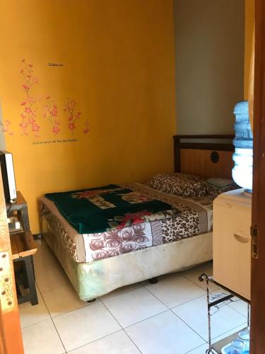 バトゥにあるVilla Cahaya 9の部屋にベッドがある寝室