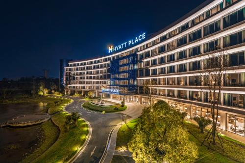 a night view of a hotel at night at Hyatt Place Changsha Airport in Changsha