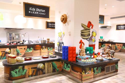 a bakery with a counter with food on it at LEGOLAND Japan Hotel in Nagoya