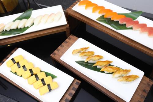three plates with different types of food on them at LEGOLAND Japan Hotel in Nagoya