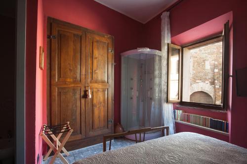 Gambar di galeri bagi Vedetta Townhouse - camere e appartamenti nel centro storico by Be Vedetta di Scarlino