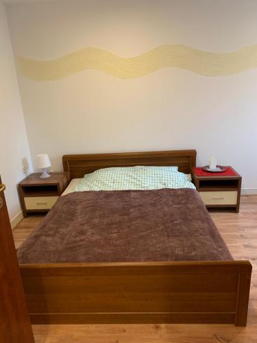 Posteľ alebo postele v izbe v ubytovaní Apartamencik Centrum