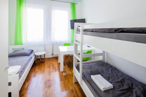 Ένα ή περισσότερα κρεβάτια σε δωμάτιο στο SecondHome Stuttgart - Moderne große Wohnungen nahe der hist Altstadt von Esslingen aN - versch Größen 8 - 11 - 19 Betten