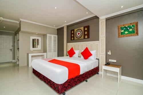 Lova arba lovos apgyvendinimo įstaigoje Natural Beach Hotel Pattaya