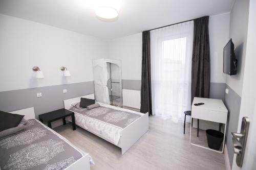 Zdjęcie z galerii obiektu White Home Room w mieście Białystok