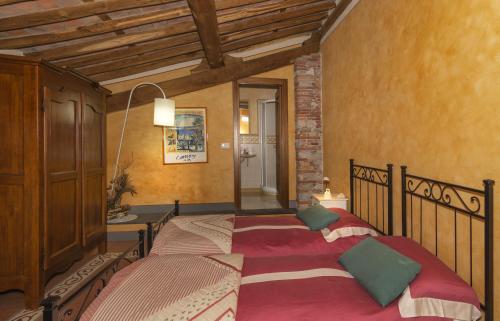 a bedroom with a large bed in a room at Tenuta San Giovanni Lucca in Lucca