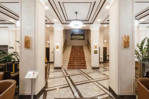 a hallway with a staircase in a building at Slavyanka in Moscow