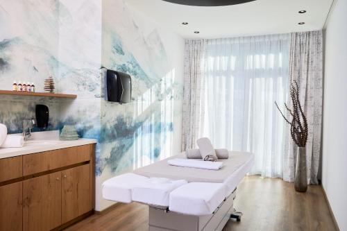 Postel nebo postele na pokoji v ubytování Zugspitz Resort