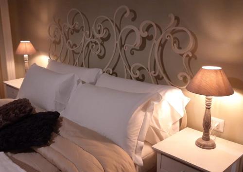 Ένα ή περισσότερα κρεβάτια σε δωμάτιο στο Vittoria Suite Milano
