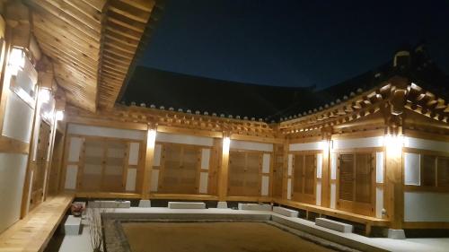 a large building with a pool in the middle at SiEunJae in Gyeongju