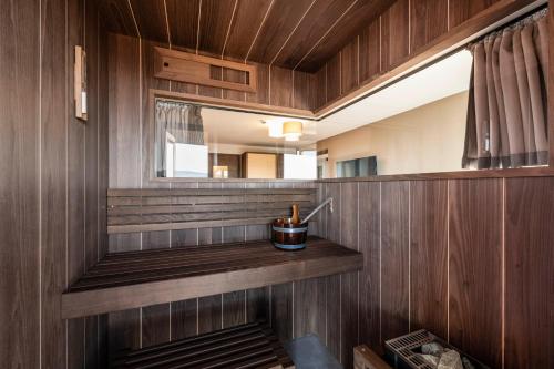 A kitchen or kitchenette at Aparthotel Panorama Living Dolomites