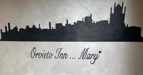a drawing of a silhouette of a city at Orvieto inn.... Mary in Orvieto