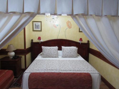 Hotel Ciudad de Vitoriaにあるベッド
