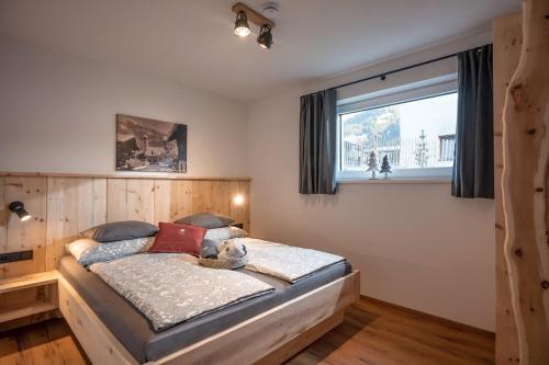 Кровать или кровати в номере Chalet Tirol