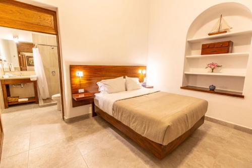 Cama o camas de una habitación en Plaza Chapala Hotel
