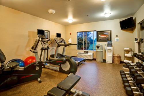 a gym with exercise equipment in a room at Holiday Inn Express Hotel & Suites Christiansburg by IHG in Christiansburg