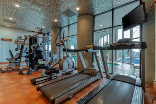 a gym with several treadmills and a treadmill at Sugar Top Condos in Sugar Mountain