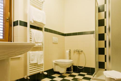 Ett badrum på Relax Style House Central Rooms