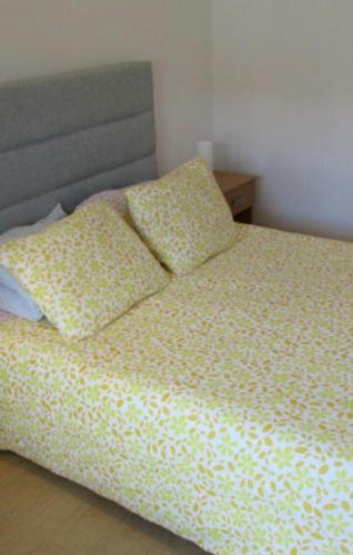 Postel nebo postele na pokoji v ubytování quarto suite em Belém