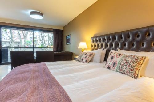 En eller flere senge i et værelse på Silky Studio in Palermo Hollywood