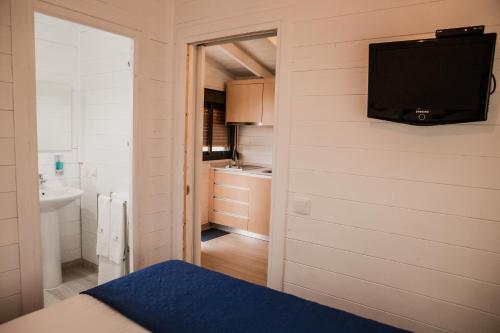 Kuchyň nebo kuchyňský kout v ubytování Hotel Neptuno