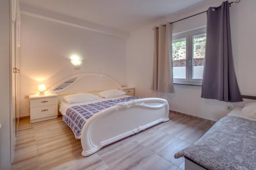 Katil atau katil-katil dalam bilik di Apartments Bajcic