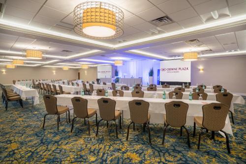 a conference room with a long table and chairs at Crowne Plaza Hotel and Suites Pittsburgh South by IHG in Pittsburgh