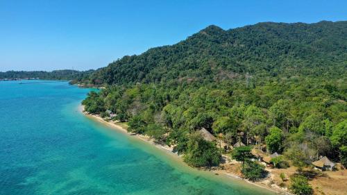 an aerial view of a beach with trees and the ocean at The Tropical Beach Resort in Ko Chang