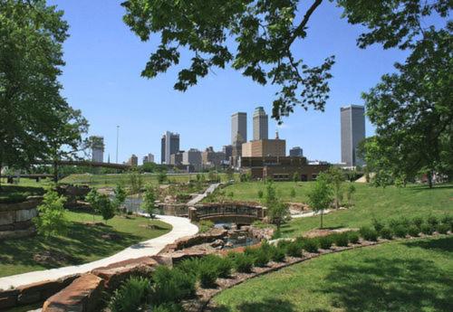 a view of a park with a city in the background at 17 West Hotel, Ascend Hotel Collection in Tulsa