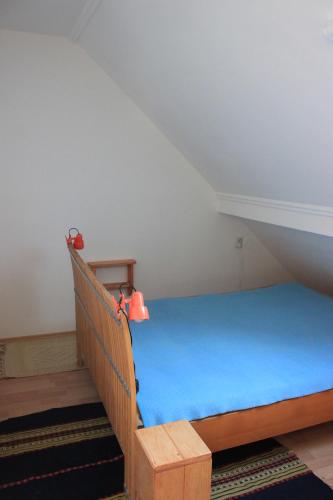 Ένα ή περισσότερα κρεβάτια σε δωμάτιο στο A Kert Apartman