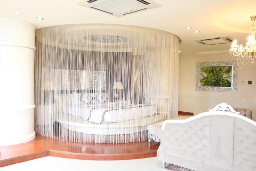 Postel nebo postele na pokoji v ubytování Viet Uc Hotel