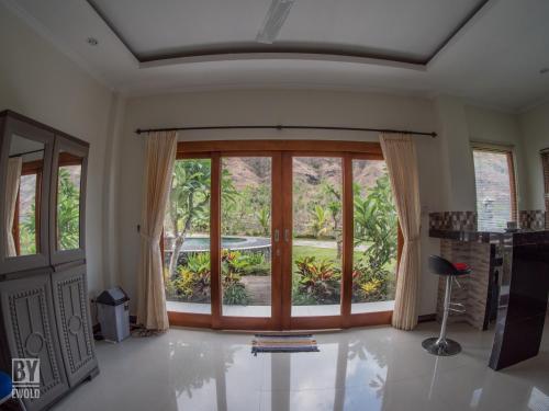 Η κουζίνα ή μικρή κουζίνα στο Anugerah Villas 2