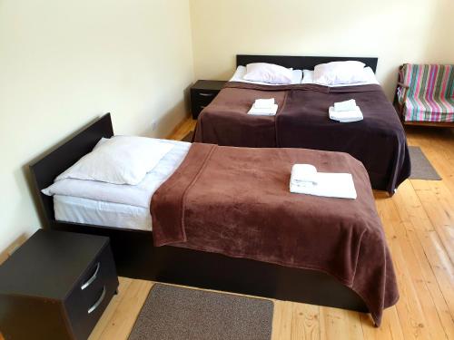 Postel nebo postele na pokoji v ubytování Red Stone Guest House