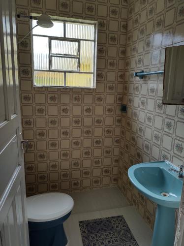 Ένα μπάνιο στο Tia Dica Hostel