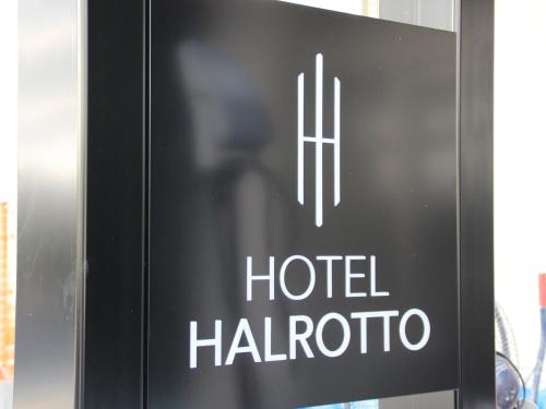 a sign for a hotel hal ricato at Hotel Halrotto Fukuoka Hakata in Fukuoka