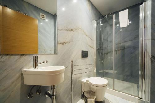 Ένα μπάνιο στο Baia Residence 2 - Holiday Apartments - By SCH