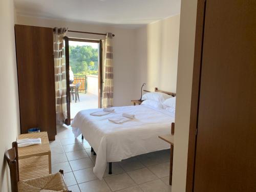 Posteľ alebo postele v izbe v ubytovaní Albergo Parco Gran Sasso