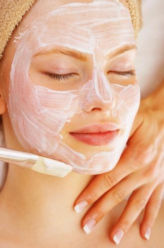 a woman with a mask on her face at Hotel Spa Pinar del Mar in Platja  d'Aro